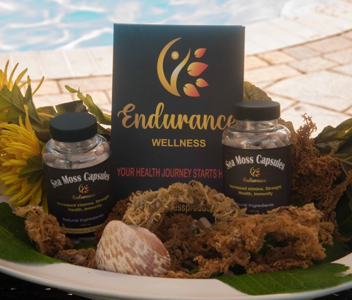 Two bottles of Endurance sea moss capsules in a tray